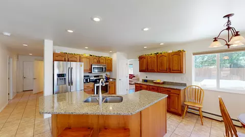 Kitchen - 882 Elberta Dr, Fruita, CO 81521 photo 3 of 4