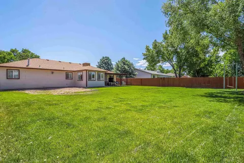 Exterior - 697 Pinyon Dr, Fruita, CO 81521 photo 7 of 11