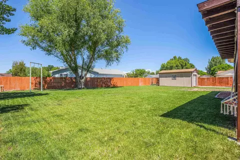 Exterior - 697 Pinyon Dr, Fruita, CO 81521 photo 5 of 11