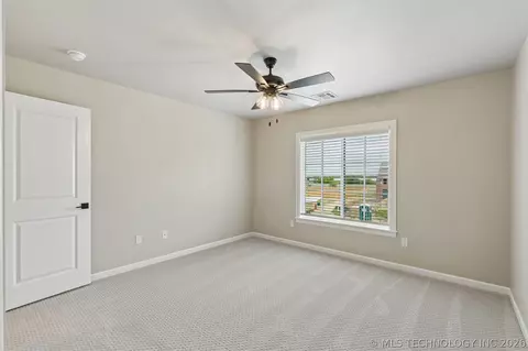 Bedroom - 214 E 164th Pl S, Glenpool, OK 74033 photo 13 of 16