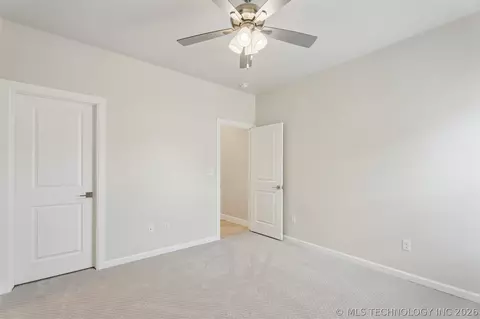 Bedroom - 84 E 165th Pl S, Glenpool, OK 74033 photo 6 of 13