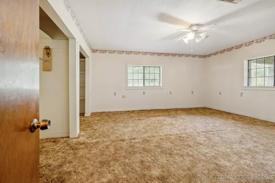 Bedroom - 32444 E 740 Rd, Wagoner, OK 74467 photo 1 of 4