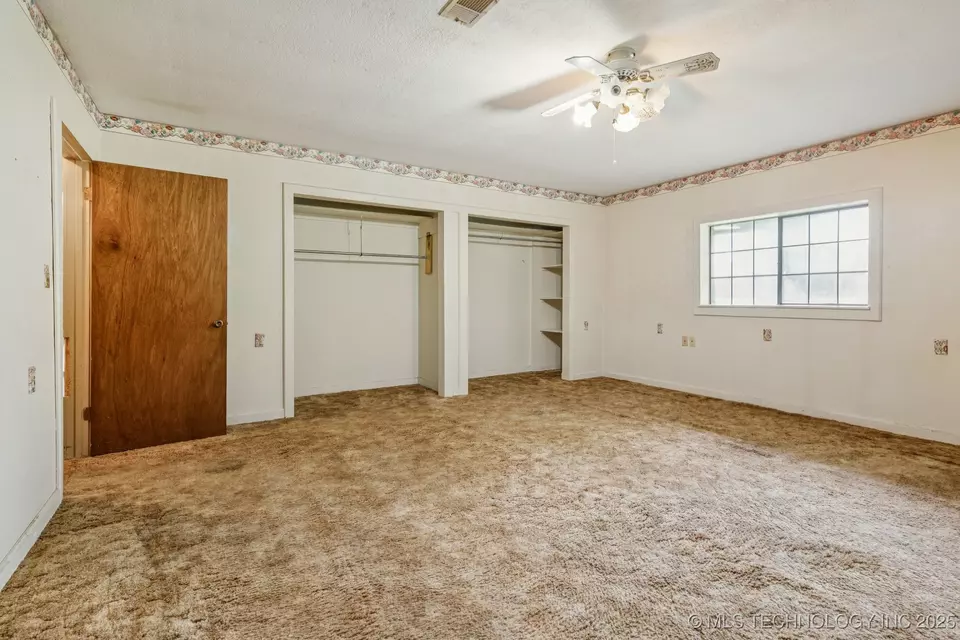 Bedroom - 32444 E 740 Rd, Wagoner, OK 74467 photo 2 of 4