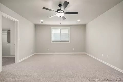 Bedroom - 14504 E 80th St N, Owasso, OK 74055 photo 5 of 6