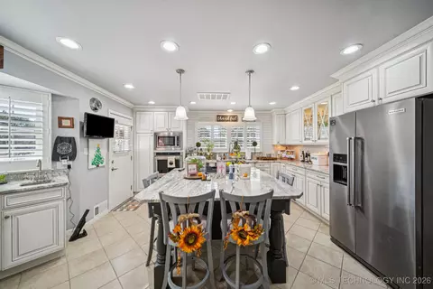 Kitchen - 1300 E 7th St, Okmulgee, OK 74447 photo 1 of 8