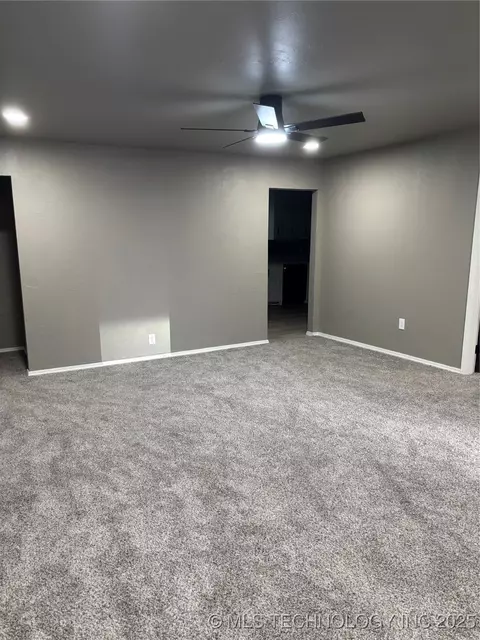 Living - 413 E 8th St, Cushing, OK 74023 photo 1 of 2