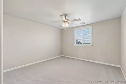 Bedroom - 101 E 165th St S, Glenpool, OK 74033 photo 16 of 18