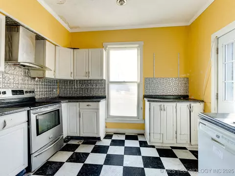 Kitchen - 130 E 16th St, Ada, OK 74820 photo 2 of 3