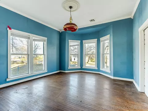 Living - 130 E 16th St, Ada, OK 74820 photo 2 of 2