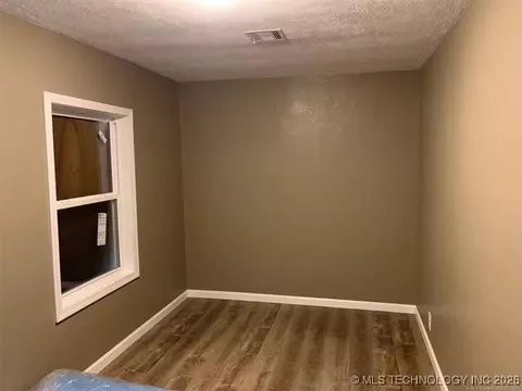 Bedroom - 8209 State Highway 20, Eucha, OK 74342 photo 3 of 3