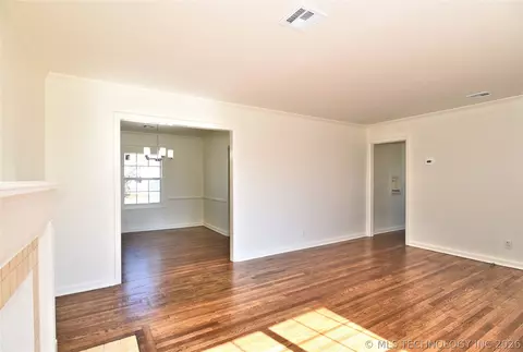 Living - 6329 E 4th Pl, Tulsa, OK 74112 photo 2 of 3
