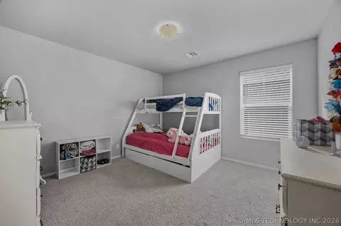 Bedroom - 7403 E 87th St N, Owasso, OK 74055 photo 3 of 5