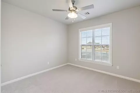 Bedroom - 668 E 148th Pl S, Glenpool, OK 74033 photo 4 of 9