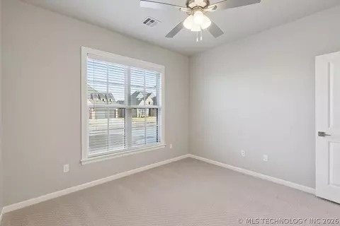 Bedroom - 668 E 148th Pl S, Glenpool, OK 74033 photo 6 of 9
