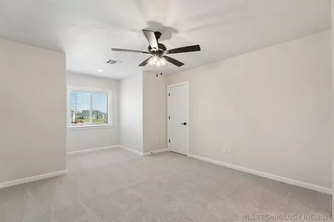 Bedroom - 31411 E Two Socks Dr, Broken Arrow, OK 74014 photo 7 of 11