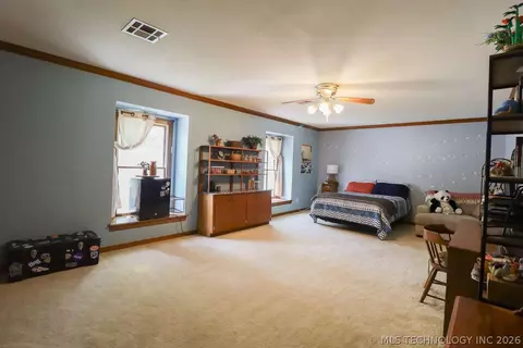 Bedroom - 5511 E 73rd St, Tulsa, OK 74136 photo 4 of 7