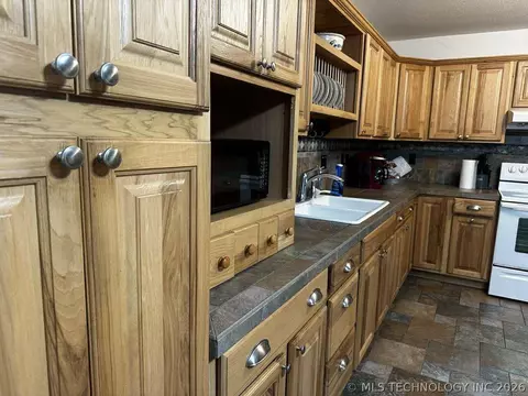 Kitchen - 264 Delaware Ave, Eucha, OK 74342 photo 2 of 3