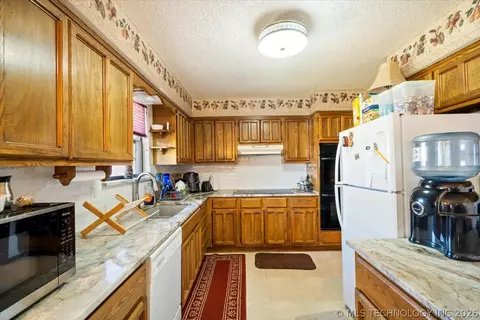 Kitchen - 10815 E 7th St, Tulsa, OK 74128 photo 1 of 2