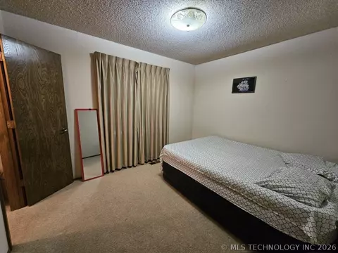 Bedroom - 10815 E 7th St, Tulsa, OK 74128 photo 4 of 4
