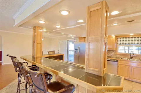 Kitchen - 1002 W Knisley Ave, Checotah, OK 74426 photo 3 of 10
