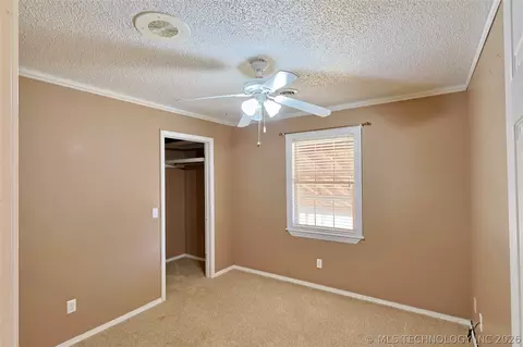 Bedroom - 1002 W Knisley Ave, Checotah, OK 74426 photo 2 of 4