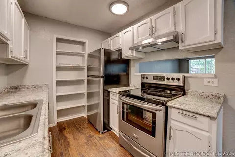 Kitchen - 10912 E 16th St, Tulsa, OK 74128 photo 2 of 2