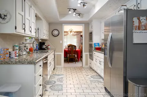 Kitchen - 5911 E 100th Pl, Tulsa, OK 74137 photo 1 of 2