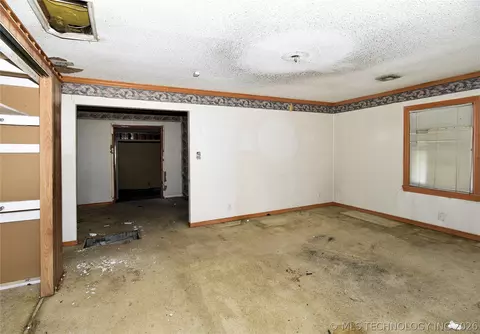 Living - 5904 E 7th St, Tulsa, OK 74112 photo 1 of 4