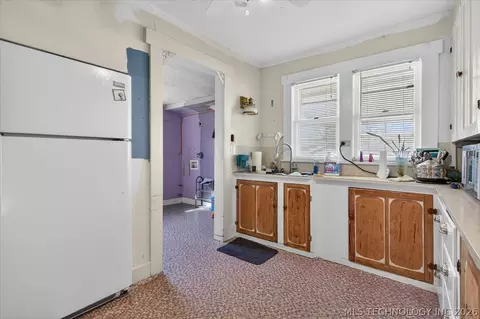Kitchen - 906 E 9th St, Pawhuska, OK 74056 photo 1 of 2