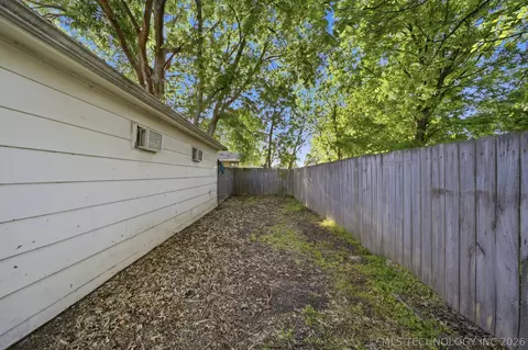 Exterior - 320 E Gentry Ave, Checotah, OK 74426 photo 8 of 9