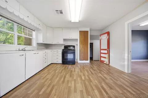 Kitchen - 320 E Gentry Ave, Checotah, OK 74426 photo 2 of 3