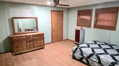 Bedroom - 417566 E 1140 Rd, Checotah, OK 74426 photo 1 of 14