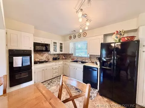 Kitchen - 8556 E 32nd St, Tulsa, OK 74145 photo 2 of 2