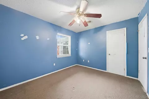 Bedroom - 422 E 25th St, Okmulgee, OK 74447 photo 2 of 3