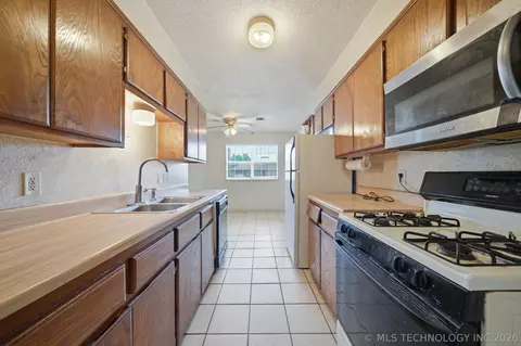 Kitchen - 422 E 25th St, Okmulgee, OK 74447 photo 1 of 2