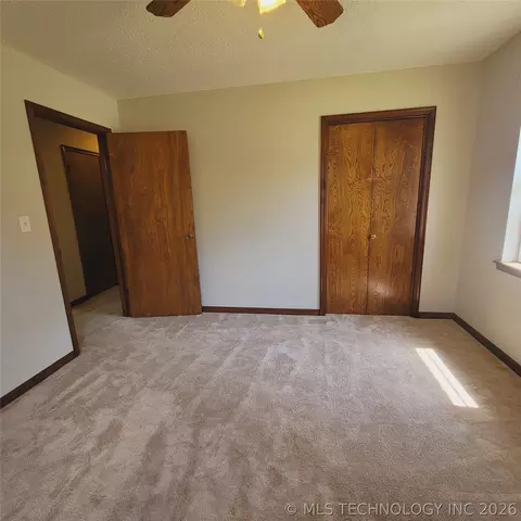 Bedroom - 414250 E 1074 Rd, Checotah, OK 74426 photo 5 of 9