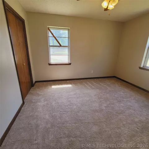 Bedroom - 414250 E 1074 Rd, Checotah, OK 74426 photo 4 of 9
