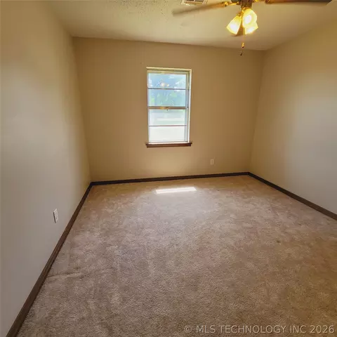 Bedroom - 414250 E 1074 Rd, Checotah, OK 74426 photo 1 of 9