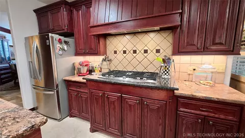 Kitchen - 418970 E 1152 Rd, Checotah, OK 74426 photo 4 of 7