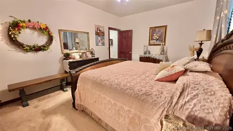 Bedroom - 418970 E 1152 Rd, Checotah, OK 74426 photo 6 of 7