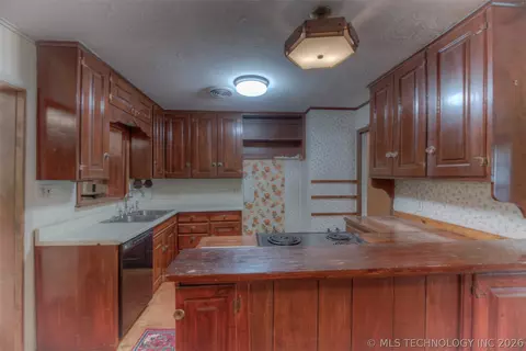 Kitchen - 8925 E 15th St, Tulsa, OK 74112 photo 1 of 5