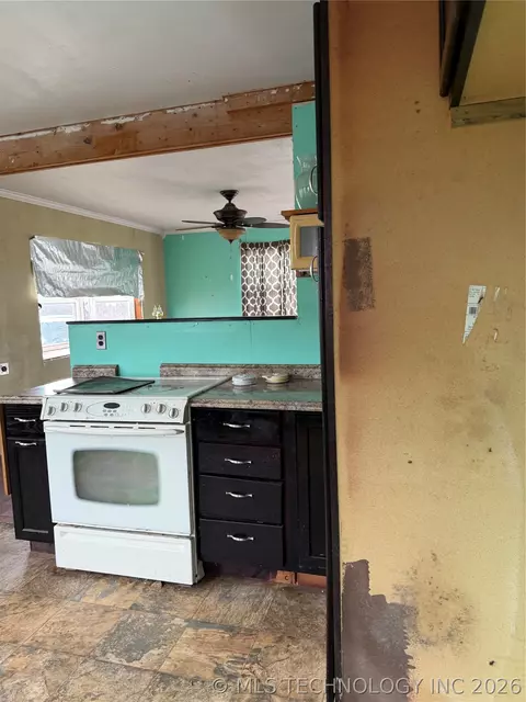 Kitchen - 517 E 3rd St, Okmulgee, OK 74447 photo 3 of 3
