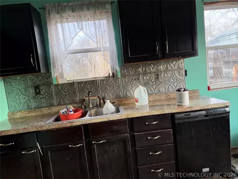 Kitchen - 517 E 3rd St, Okmulgee, OK 74447 photo 2 of 3