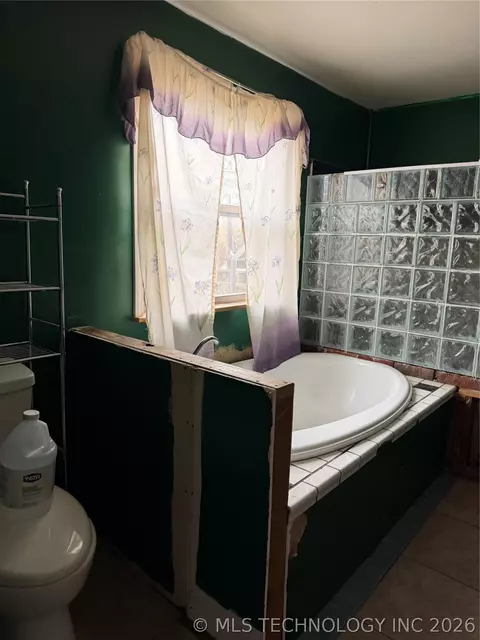 Bath - 517 E 3rd St, Okmulgee, OK 74447 photo 1 of 2