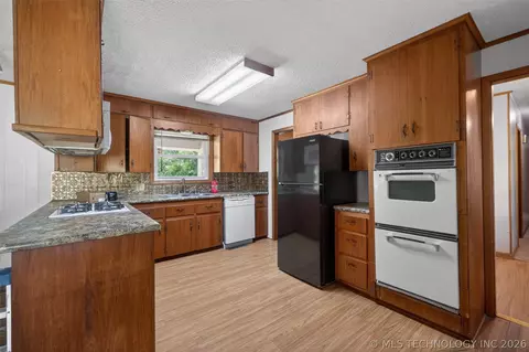 Kitchen - 220 E 20th St, Okmulgee, OK 74447 photo 1 of 3