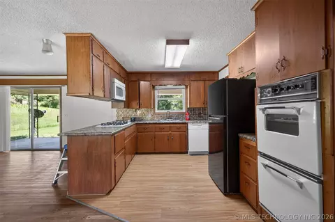 Kitchen - 220 E 20th St, Okmulgee, OK 74447 photo 2 of 3
