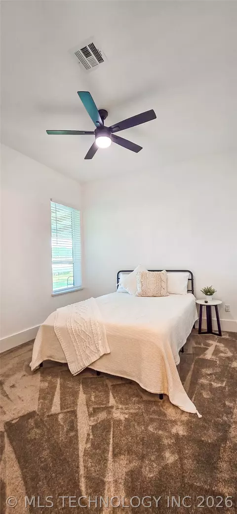 Bedroom - 418529 E 1110 Rd, Checotah, OK 74426 photo 10 of 12