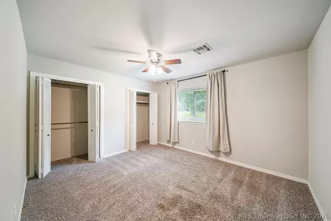 Bedroom - 7120 E 69th St, Tulsa, OK 74133 photo 2 of 6