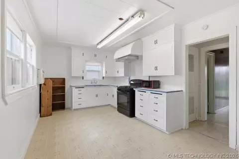 Kitchen - 1011 E 14th, Ada, OK 74820 photo 2 of 5