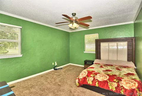 Bedroom - 9419 Haskell Dr NW, Broken Arrow, OK 74014 photo 3 of 7
